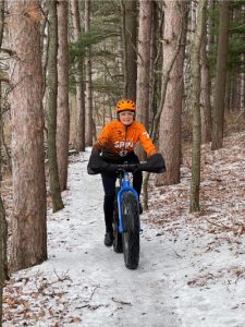 Anne Grofvert Riding Fat Tire Bike on Winter Trail