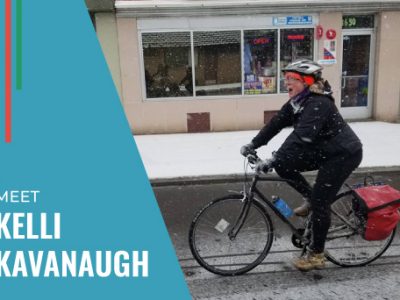 Kelli Kavanaugh owner of Wheelhouse Detroit riding bike in snow