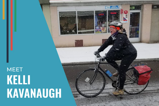 Kelli Kavanaugh owner of Wheelhouse Detroit riding bike in snow