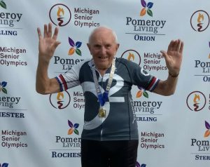 Cadieux Bicycle Club member with race medal