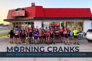 Morning Cranks Club standing in front of the Donut Cutter